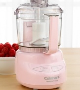 Add a touch of pink to your food prep. This peppy little food processor makes a big impression with patented reversible blades and an innovative design to help you switch seamlessly from chopping to grinding with the push of a button. 18-month manufacturer's warranty. Model DLC-2A.