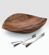 An artisan bowl is handcrafted of dense, durable acacia with a finely patterned grain and modern, sloping lines. Unique servers made of stainless steel define this beautiful serving set. 19W X 5H X 12½D Hand wash Imported