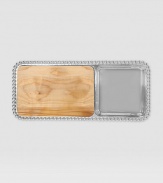 An entertaining essential handcrafted of recycled aluminum with a wood cheeseboard insert. This eco-friendly alternative is made by artisans using a process that is ecologically sound. 8 x 18 Beaded edge Handwash Imported