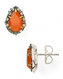 The garden serves as inspiration for this pair of thorn-shaped studs from Elizabeth and James, accented by striking carnelian and garnet stones.