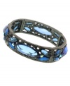 Total tranquility: In soothing shades of light blue, 2028's stretch bracelet will complement a variety of looks in your wardrobe. Crafted in hematite tone mixed metal with plastic stones. Bracelet stretches to fit wrist. Approximate diameter: 2-1/4 inches.