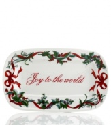 Martha Stewart Collection makes the table merrier with the Holiday Garden bread tray. Adorned with Joy to the world, it's a beautiful collectible trimmed in holiday greens and made for family meals in durable white porcelain.