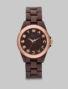 A ultra-lightweight design with a playful logo accented dial. Quartz movementWater resistant to 5 ATMRound brown aluminum case, 36mm (1.4)Smooth rose goldtone ion-plated bezelBrown dialLogo hour markersSecond hand Brown aluminum bracelet, 18mm wide (0.7)Imported