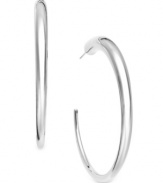 The perfect complement to any look, these polished, three-quarter hoop earrings add a much-needed touch of shine. Set in sterling silver. Approximate diameter: 2 inches.