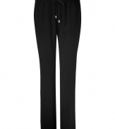 Stylish pants in fine, black viscose blend - Relaxed slim silhouette, on-trend ankle-cropped length - Medium low rise with drawstring, elasticated waist and side pockets - Versatile and casually cool, easily dressed up or down - Pair with a silk top and strappy sandals, or go for a more casual look with a t-shirt, cardigan and sandals