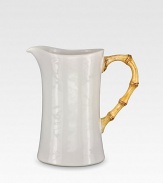 An elegant, sculptural and incredibly versatile pitcher is crafted in ceramic stoneware and finished with handpainted detail. From the Classic Bamboo Collection 2-qt. capacity 9H X 6 diam. Dishwasher safe Imported 