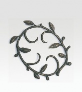 Inspired by the lush growth of an enchanted fairytale forest, this curling vine design is sand cast and sculpted into a graceful trivet.From the Vine Collection Oxidized bronze 7½W x 7½L Nickelplate Hand wash Imported