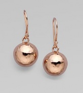 Glowing hammered spheres are both classic and modern, in sterling silver and 18k gold, finished in rich, warm 18k rose goldplating.18k gold and sterling silver with 18k rose goldplatingDrop, about 1Ear wireImported