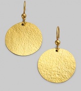 Richly textured discs of hammered 24k gold swing from graceful golden beads. 24k yellow gold Diameter, about 1 Ear wire Imported