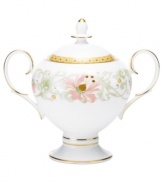 East meets West in the ornate Blooming Splendor sugar bowl by Noritake. A Japanese-inspired pattern with raised dots pairs with intricate florals rooted in white bone china.