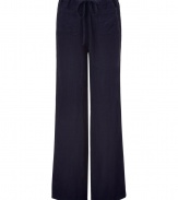 Up the ante on casual chic with Vinces elegant navy beach pants - Soft, ultra-lightweight summer linen - Easy, lower rise drawstring tie waist - Two pockets at hips and two button pockets at rear - Flattering, wide-leg cut bells gently at hem - Pair with t-shirts, tanks and caftans or layer over a bikini