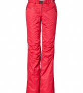 Make a chic statement on the slopes in Jet Sets bright red ski pants, finished with a flattering cut guaranteed to show off your sporty side in style - Zip fly, zippered front pockets, adjustable belt in front, straight leg with silver star circle print, flared zippered ankles, elasticized band at the ankle with silicon for hold - Fitted through the knee - Wear with figure-hugging turtlenecks and cozy shearling lined boots