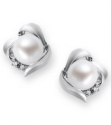 A simple, sophisticated touch. These petite knot-shaped stud earrings feature a cultured freshwater pearl (7 mm) and sparkling diamond accents at the sides. Set in sterling silver. Approximate diameter: 3/8 inch.