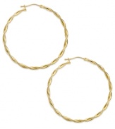 Twisted hoops add a layer of dimension and polish to any look. Crafted in 14k gold with a lever backing. Approximate diameter: 1-1/2 inches.