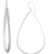 A stylish look takes shape in these drop earrings. Crafted from platinum over sterling silver, the oval pair dazzles with diamond accents. Approximate drop: 2-9/10 inches. Approximate width: 1-1/2 inches.