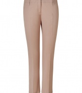 Elegant pant in fine, pale rose nylon and cotton stretch blend - Modern, narrow cut is slim through calves, crops at ankles - Crease detail extends from hip to hem, elongating and flattering the silhouette - Pockets at sides, welt pockets at rear - Lower rise with belt loops and tab closure - Polished and chic, ideal for both work and evenings out - Pair with a silk or sequin top, a jacket and platform pumps