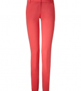 Stylish pants in fine, viscose and synthetic fiber blend - Especially comfortable, thanks to a touch of stretch - Vibrant and on-trend in bright coral - Lower rise, slim cigarette cut crops at ankles - Tab waist, belt loops and slash pockets at sides - Crease detail flatters and elongates the leg - Versatile and ultra-chic, seamlessly transitions from work to weekend - Pair with a silk blouse, blazer and peep toe pumps, or go for a more casual look with a tunic top and flat sandals