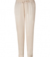 Stylish pants in fine, pure viscose - Sumptuously soft, lightweight material in classic nude - Slim yet relaxed, low rise cut - Gathered drawstring waist - Slash pockets at sides, welt pockets at rear - Fashionable 7/8 length crops at ankles - Casually elegant, easily dressed up or down - Pair with a fitted t-shirt and leather sandals, or try a silk tank, blazer and wedges