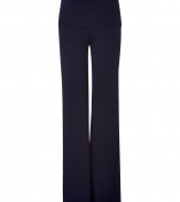 Sumptuously soft and effortlessly cool, Donna Karans pure, ink blue cashmere blend knit pants epitomize understated luxury - Crafted with a touch of flattering stretch material - Slim, medium-rise pull on style with fold-over waist - Bell cut flares gently at hem  - A must for chic off duty looks - Pair with cashmere pullovers,  button downs and tunic tops