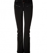 Make a chic statement on the slopes in Jet Sets ultra modern stretch ski pants, finished with a flattering cut guaranteed to show off your sporty side in style - Zip fly, zippered front pockets, adjustable belt in front, straight leg with silver star circle print, flared zippered ankles, partially lined legs from the hemline to thigh, elasticized band at the thigh with silicon for hold - Fitted through the knee - Wear with figure-hugging turtlenecks and cozy shearling lined boots