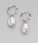 Distinctive white baroque pearls dangle delightfully from hammered sterling silver hoops. 12mm white baroque organic man-made pearls Sterling silver Hoop diameter, about ½ Post back Made in Spain