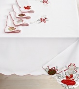 All the trimmings. Prepare for a jolly-good time with the Holiday Ornaments tablecloth, featuring a simple white cloth festooned with holly embroidery, colorful ornaments and a scalloped edge.