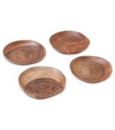 A real natural, this set of Acacia Wood appetizer plates celebrates the earth's bounty with a rich grain and russet-brown hue. By Marcela for Prima Design.