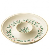 Lenox's popular Holiday pattern - a colorful holly and berry motif - on ivory fine china is the perfect way to add warmth to any gathering. Accented with 24 karat gold.