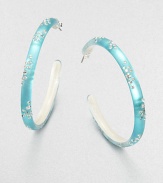 From the Lucite Wanderlust Collection. Slender hoops of hand-painted, hand-sculpted Lucite, sprinkled with the shimmer of Swarovski crystals.CrystalLuciteDiameter, about 2Post backMade in USA