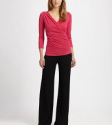 Flattering wide-leg silhouette, rendered in an easy stretch jersey knit.Mid-rise waistband Flat-front Inseam, about 33½ 70% rayon/27% polyester/3% spandex Dry clean Imported