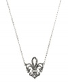 Add a little regal resplendence to your look. Judith Jack's stunning Fleur De Lis pendant features an intricate cut-out design accented by glittering marcasite and clear crystal. Set in sterling silver. Approximate length: 16 inches. Approximate drop: 7/8 inch.