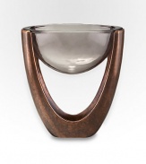 Forget the coaster or trivet: this ingenious design features a bronze-finish alloy structure that holds a glass bowl in mid-air suspension. From the Heritage Pebble CollectionAntique copper-plated alloy with glass plates11W X 6 H X 12DHand wash Imported