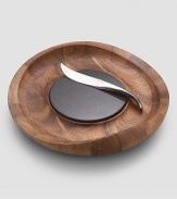 A stunning artisinal accent is handcrafted in a swooping design from dense, durable acacia hardwood. A granite cutting surface and 9 18/10 stainless steel knife make it the ideal serving piece for cheese and other hors d'oeuvres..Naturally resinous wood resists stains and odors 2½H X 14 diam. Hand wash Imported