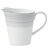 Band together around dinnerware that's equally suited for every day and entertaining. Clean lines and shades of gray in white bone china define the Islington creamer with easy sophistication. From Royal Doulton.