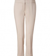 Add luxe a appeal to your wardrobe favorites with these cropped pants from Akris - Flat front, off-seam pockets, back welt pockets, front creased detail, cropped fit - Pair with a cashmere pullover and embellished ballet flats