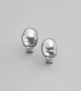 EXCLUSIVELY AT SAKS. Shapely and simple baroque pearls in soft grey make classic button earrings, in a sterling silver setting. 14mm organic man-made pearls Sterling silver Post and hinge back Made in Spain