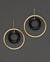 Hoop earrings crafted from concentric circles of 18K gold and rich black onyx. Designed by Faraone Mennella.