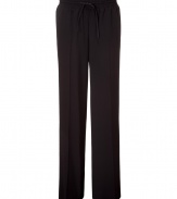 Combine comfort and trend-right style with these wide leg pants from DKNY - Elasticized waist with drawstring, straight cut wide leg, front crease detail, cuffed hem - Pair with a long sleeve henley, a boyfriend blazer, and peep-toe platforms