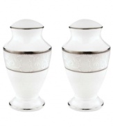 This elegant salt shaker is accented with a delicate flourish of vine-like, white-on-white imprints with raised, iridescent enamel dots. From Lenox's dinnerware and dishes collection.