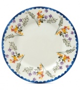 Freshen up. Colorful wildflowers scatter on the Scallop Floral salad plate, a charming addition to country settings from Marcela for Prima Design. With dainty blue trim.