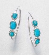 From the Rock Candy Collection. Graduated ovals of faceted turquoise add vivid color near your face, elegantly set in sterling silver with a modern sculptural look.TurquoiseSterling silverDiameter, about 1.5Post backImported