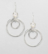 From the Scultura Collection. Circular sterling silver hoops accented with luminous mother-of-pearl in a pretty drop design. Mother-of-pearlSterling silverDrop, about 1.9Hook backImported 