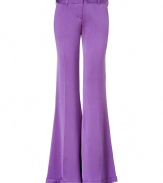 Stylish pants in fine purple silk - From the French luxury label Balmain - New, wide flared leg silhouette with figure-flattering creases - Crazy trendy and casual - A blockbuster basic for everyday - Pair with a beige tie blouse and pumps