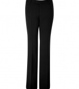 With a long, lean cut and slightly flared ankle, Steffen Schrauts black pants are the perfectly versatile choice for workweek chic - Side and buttoned back slit pockets, zip fly, button closure, belt loops - Loosely tailored fit - Wear with a feminine satin top and heels