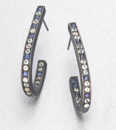 Elegant arcs set with icy cool gemstones are edged and backed with smooth enamel in this stunning yet simple design.Blue sapphire, white topaz and blue topazBlack rhodium-plated sterling silverLength, about 3Post backImported