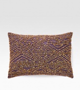 A rustic, wholly exotic pillow is defined by wood beads that add depth and texture wherever you place it.12 X 16Beaded cottonSpot cleanImported