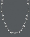 Perfect with a white blouse, even better doubled up with a little black dress. Long necklace by Lauren Ralph Lauren features clusters of silvertone beads. Crafted in mixed metal. Approximate length: 36 inches.