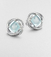 Beautiful aqua chalcedony cabochons framed by iconic sterling silver cable rings. Aqua chalcedonySterling silverSize, about .25Post backImported 