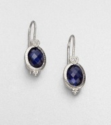 From the La Petite Collection. Faceted, rich corundum set in textured sterling silver accented with brilliant white sapphires. CorundumWhite sapphireSterling silverDrop, about .4Hook backImported 