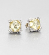 Beautifully faceted canary crystal stones set in intricately designed, sterling silver accented with dazzling white sapphires. Canary crystalsSterling silverWhite sapphiresSize, about .4Post backImported